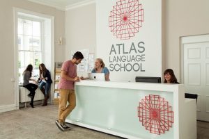 Atlas Langauge School staff helping students