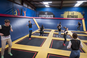 Atlas young learner students playing on trampolines in Dublin
