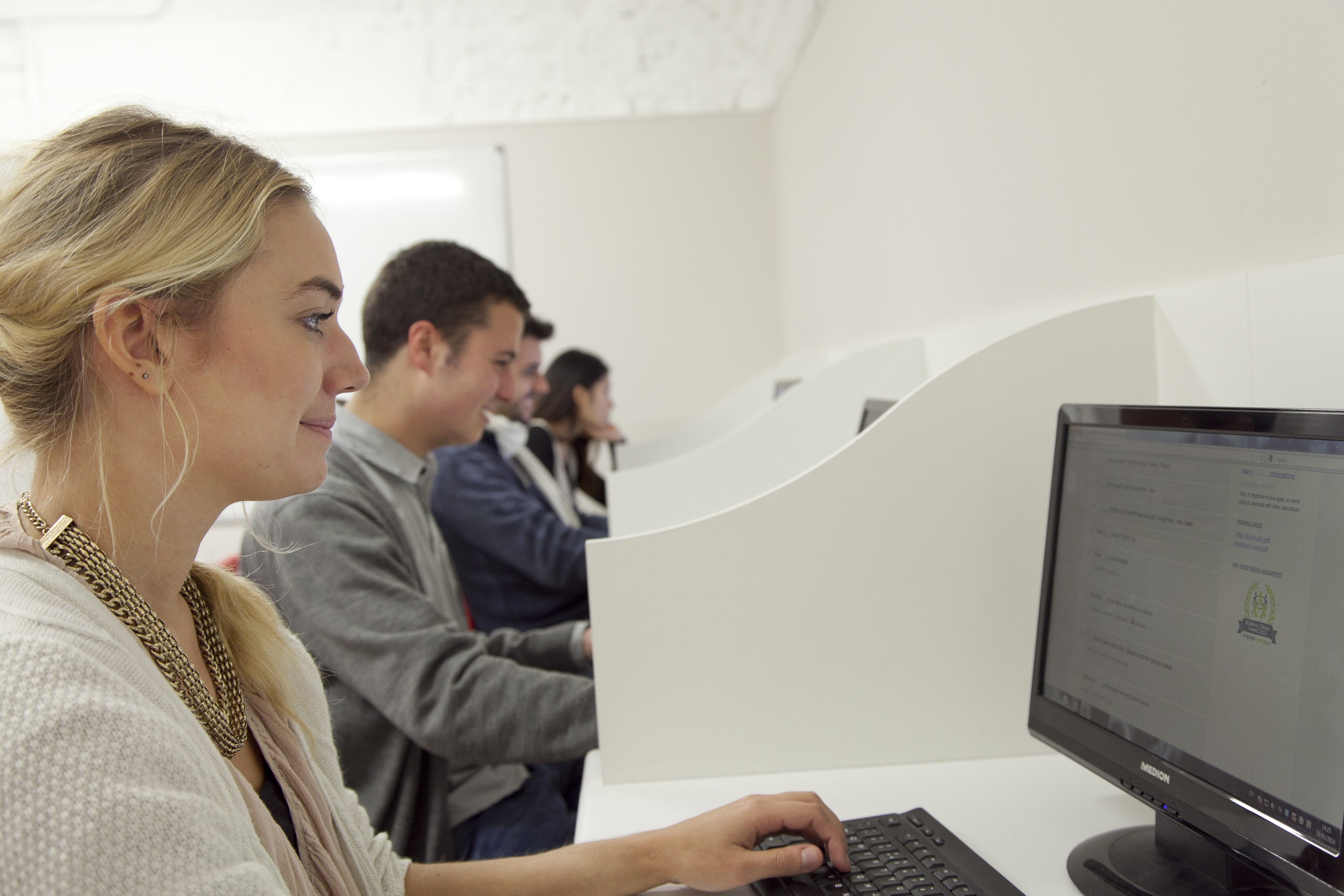 Atlas students in the computer room doing Study & Internship programme