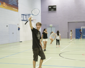 Atlas Junior student playing tenis at Chichester campus.