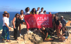 Atlas Language School students with english teacher in summer Maltese landscape