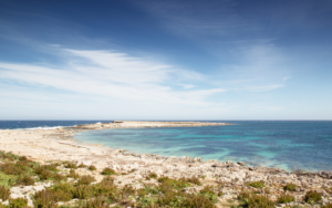 Natural rocky beach of Qawra Point in Malta