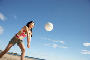 Atlas Junior Malta student playing beach volleyball