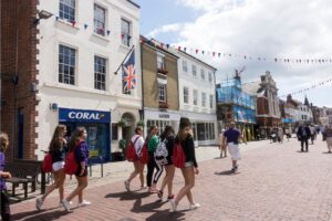 Students from Atlas Junior Chichester walking in Chichester town in the UK as part of the tour.