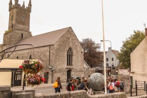 Students from Atlas Junior Clare touring Ennis town.