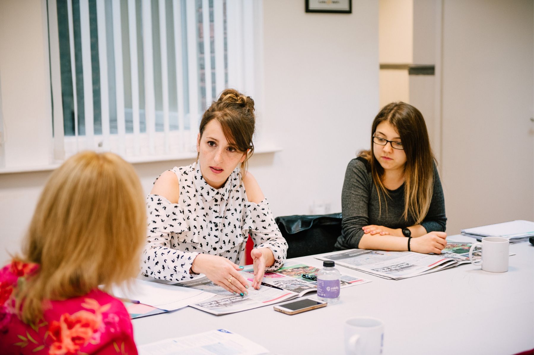 Atlas Liverpool General English course students actively engaging in classroom activities.