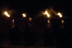 Celtic Samhain celebration in Ireland, featuring bonfires and traditional costumes representing Halloween origins.