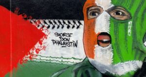 A portrait of DJ Próvaí from Kneecap, a political Irish rap trio known for their activism.
