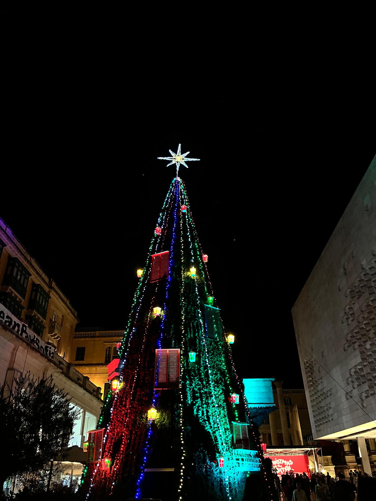 Christmas tree on the main street of Valletta at night
