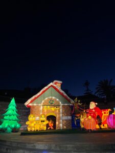 Illuminated Santa's cabin at night