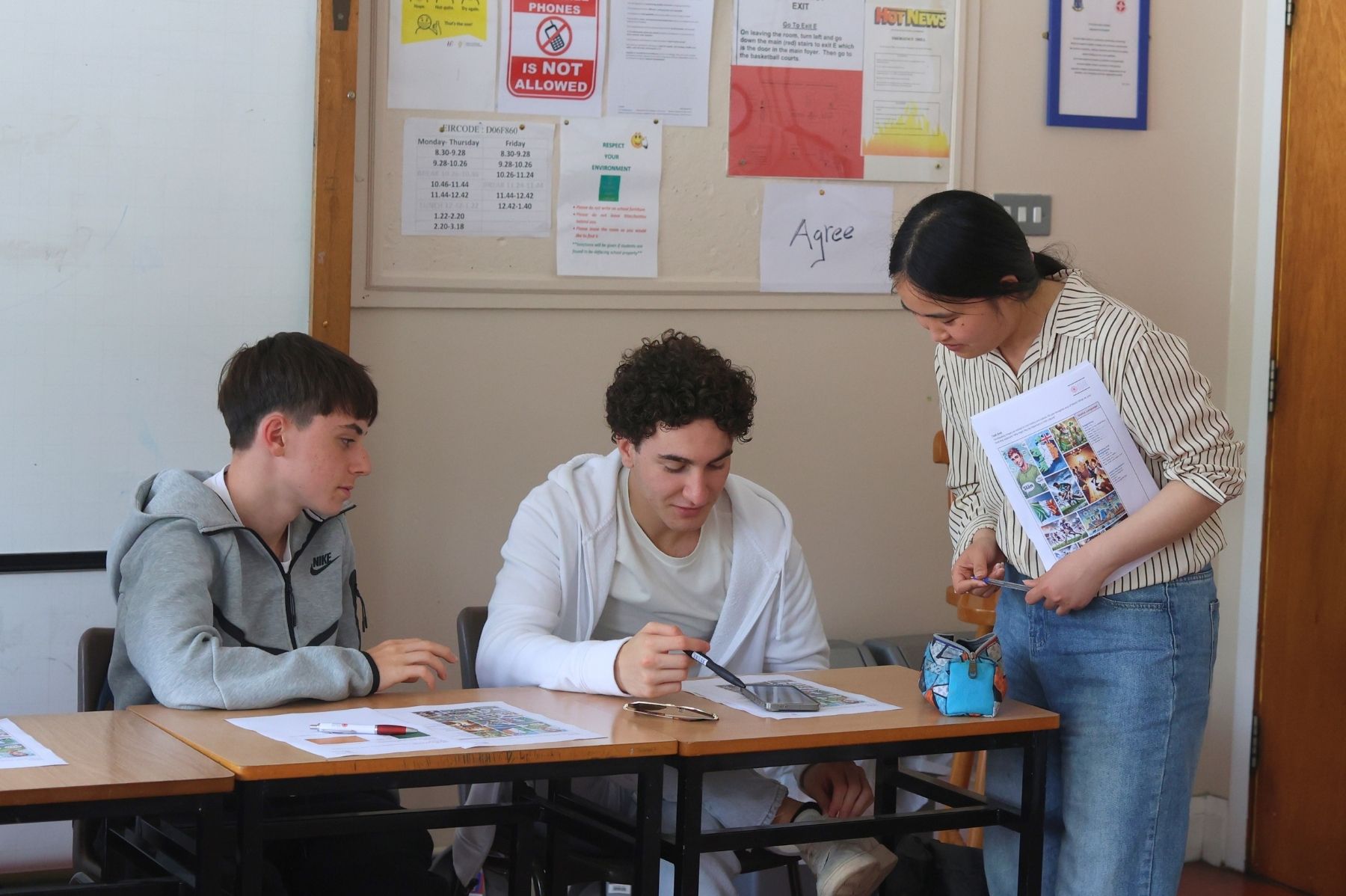 Young learners at English class at school